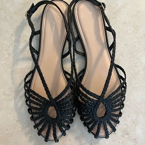 Black strapped Anthropologie flats